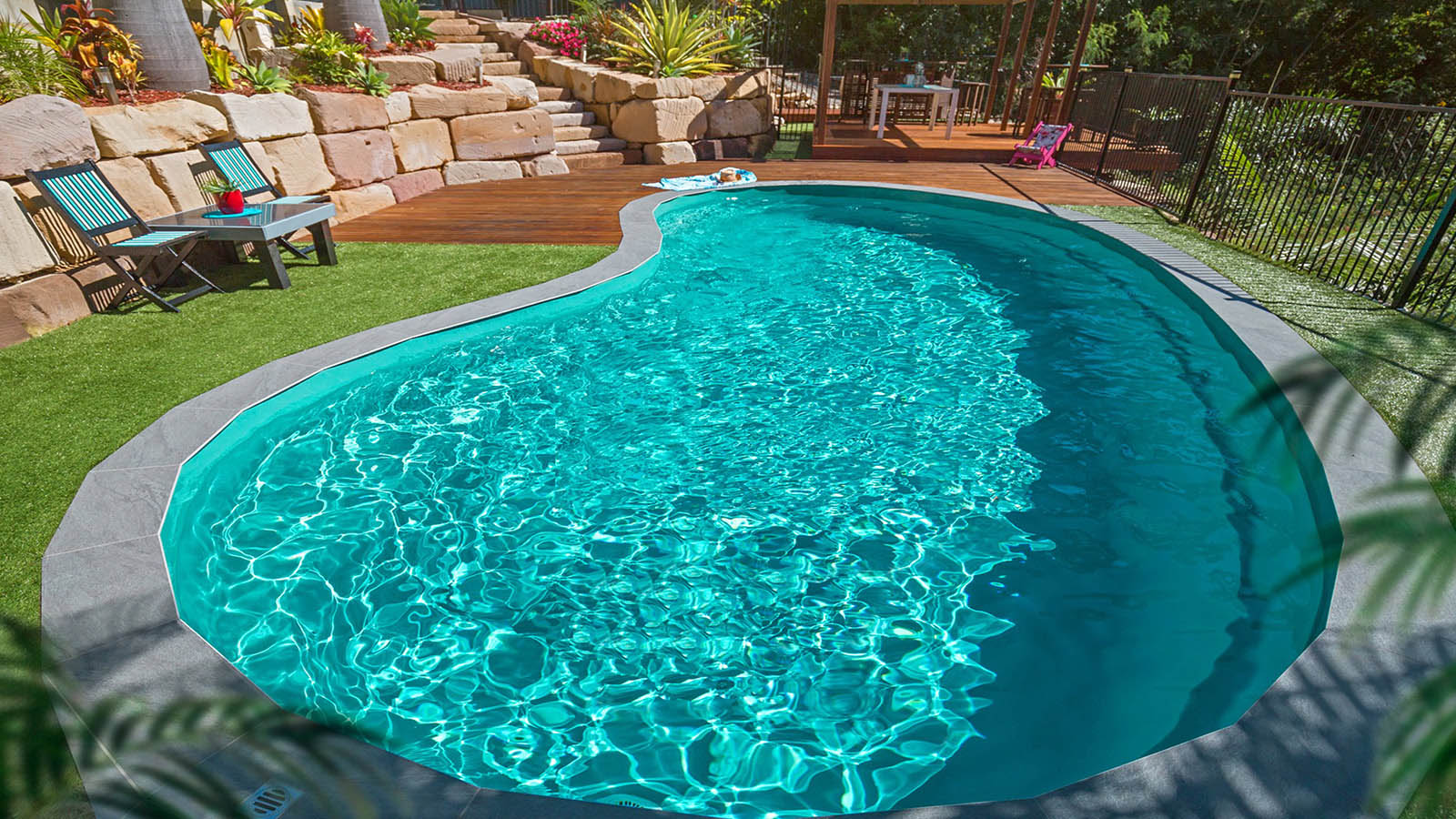 Aquamarine_Hero Outdoor Kitchens & Landscape Features