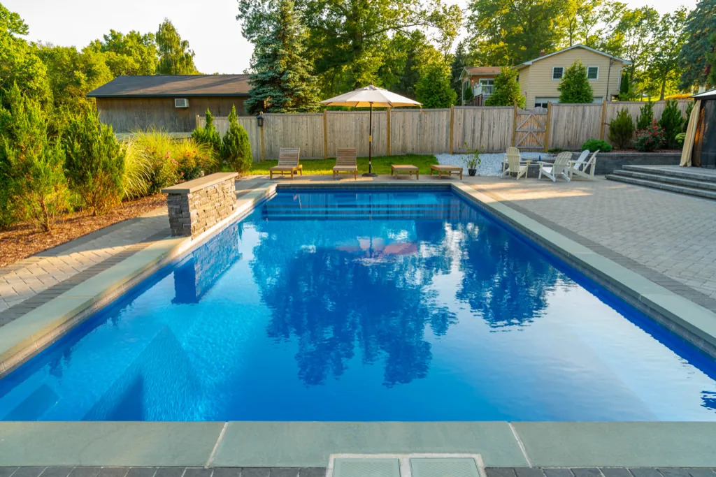 Inground fiberglass pool installed by Leisure Pools Hudson Valley in Wappingers Falls, NY