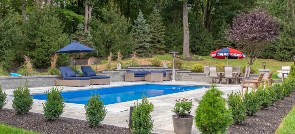 Inground fiberglass pool installed by Leisure Pools Hudson Valley in Hopewell Junction, NY