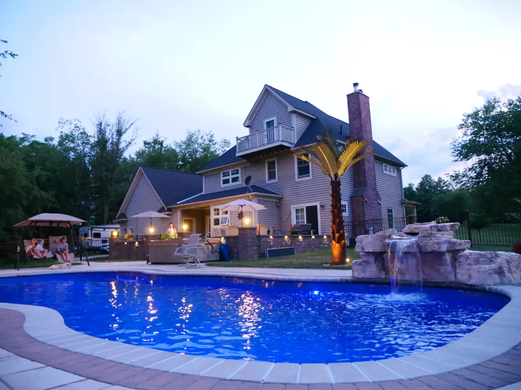 Inground fiberglass pool installed by Leisure Pools Hudson Valley in Woodbury, NY
