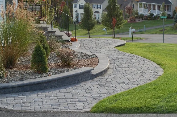 walkways Leisure Pools Hudson Valley offers walkway and retaining wall design and installation services in Highland Falls, NY
